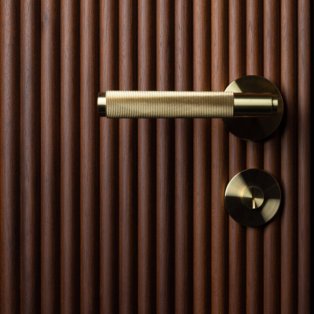 Buster + Punch Cross door handle brass lifestyle by Araco Interiors