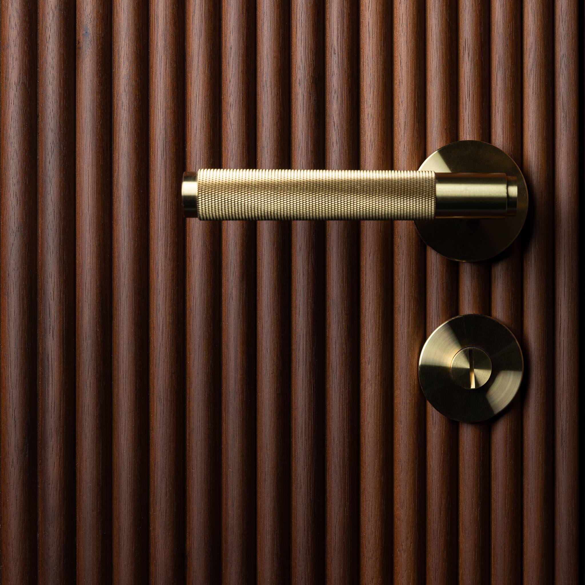 Buster + Punch Cross door handle brass lifestyle by Araco Interiors