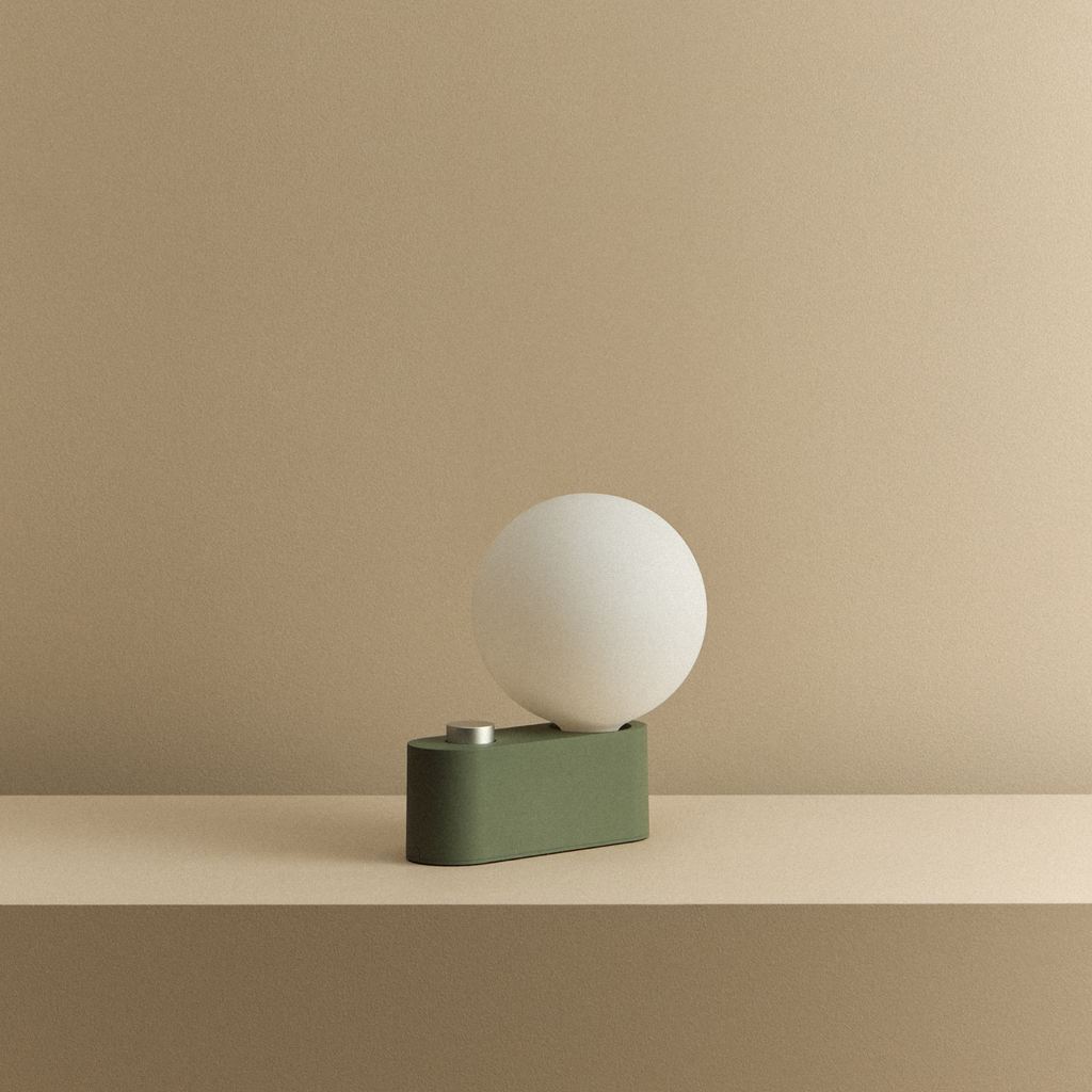 Tala Alumina Multi-Use Lamp in Sage shown unlit