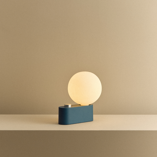 Tala Alumina Multi-Use Lamp in Sapphire shown illuminated