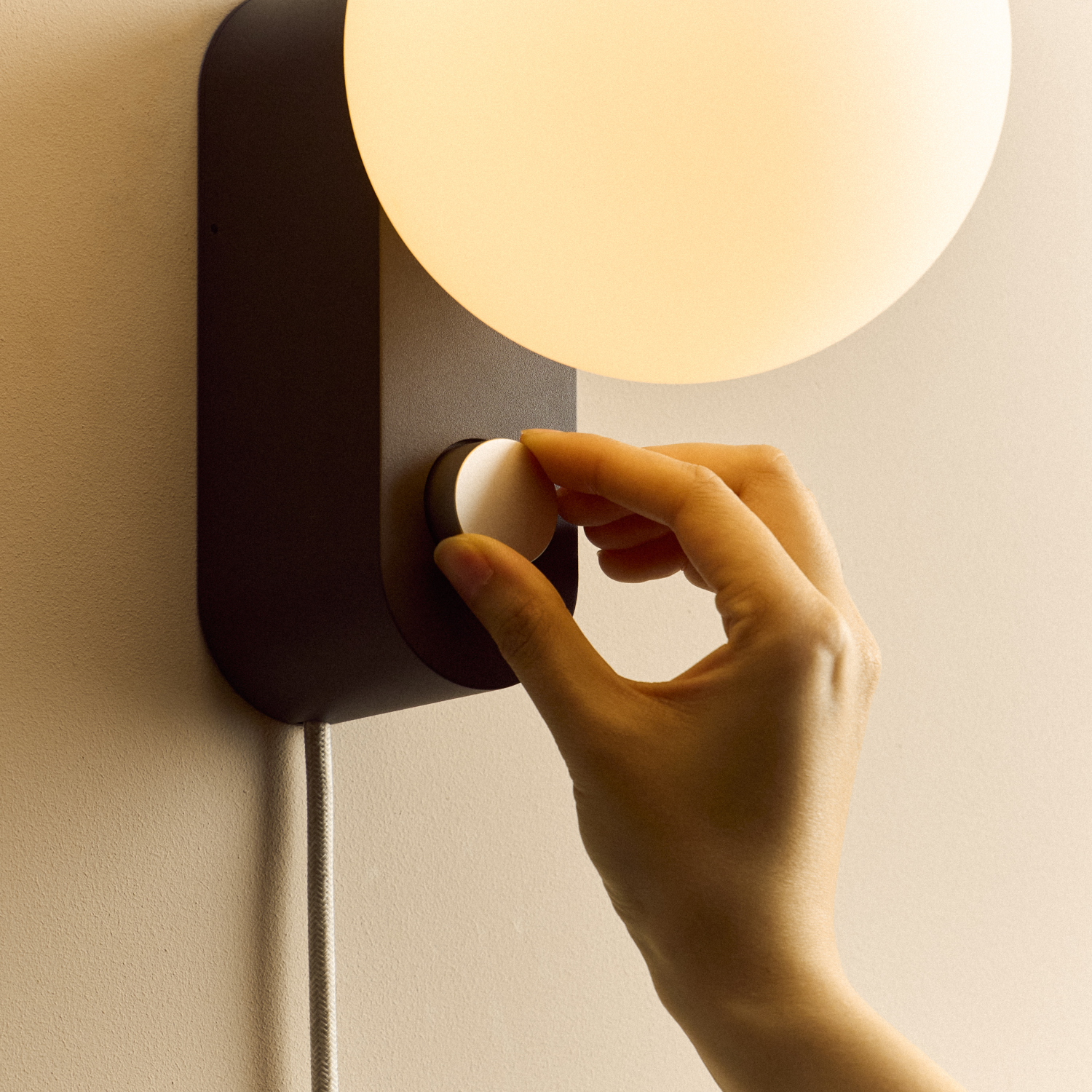 Tala Alumina Multi-Use Lamp in Charcoal close-up detail of the finish (view 2)