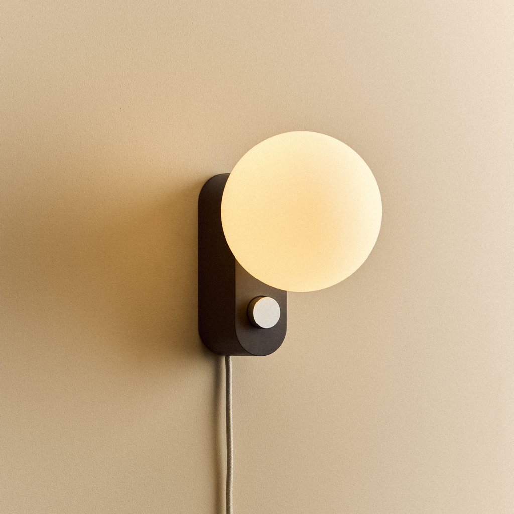 Tala Alumina Multi-Use Lamp in Charcoal shown illuminated (view 2)