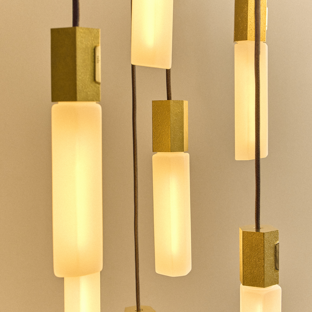 Tala Basalt Nine Pendant in Brass close-up detail of the finish