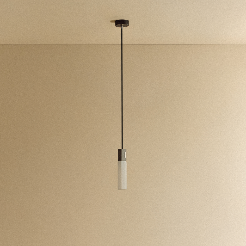Tala Basalt Single Pendant in Stainless Steel shown unlit