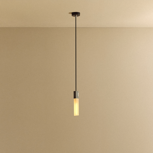 Tala Basalt Single Pendant in Stainless Steel shown illuminated