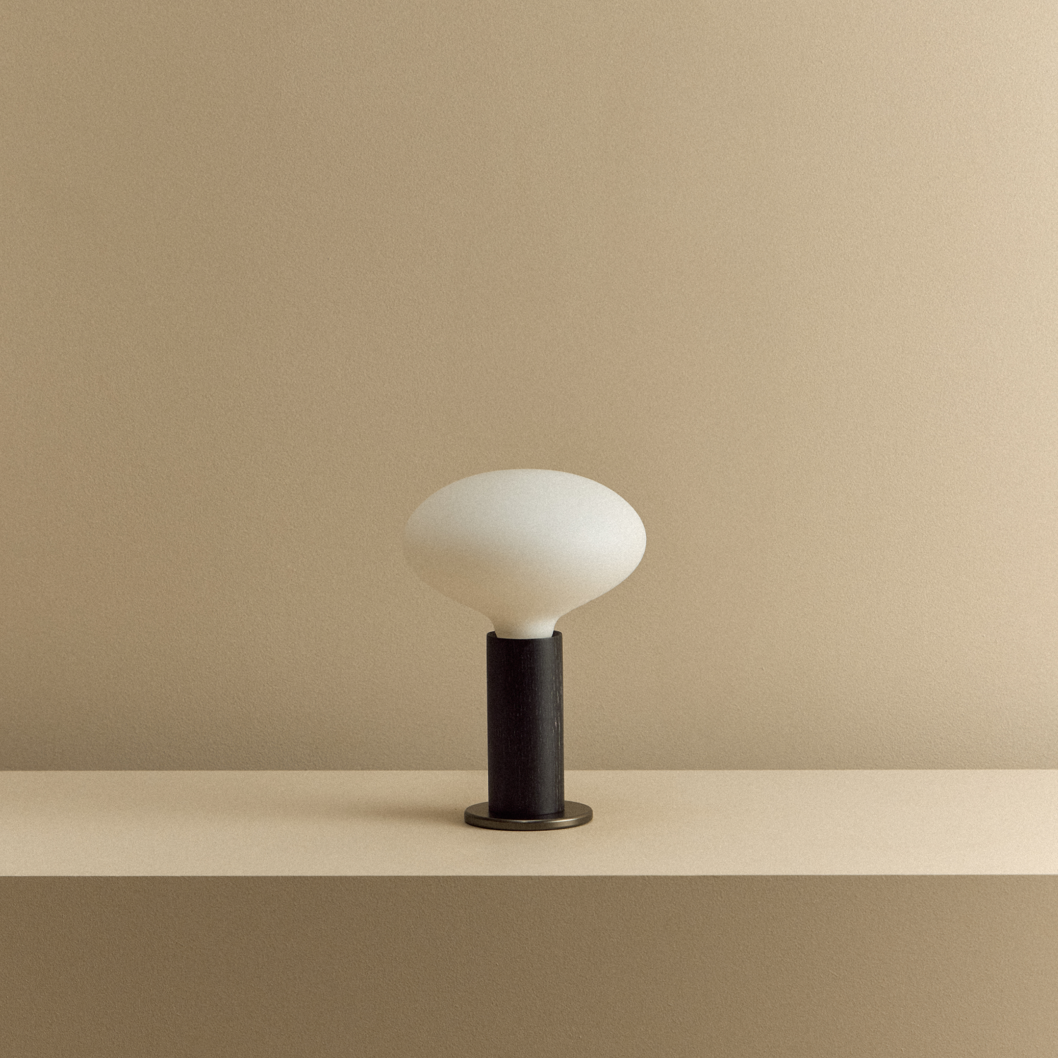 Tala Knuckle Table Lamp in Blackened Oak + Oval shown unlit