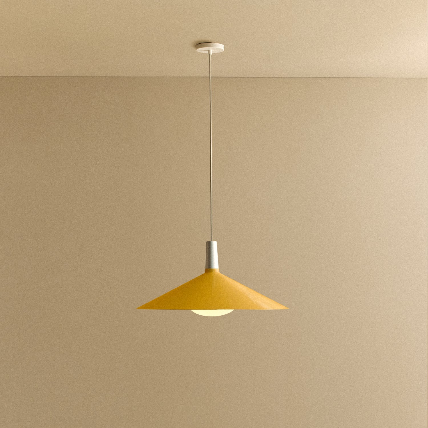 Tala Bower Pendant Light Large in Yellow + Oval II shown illuminated