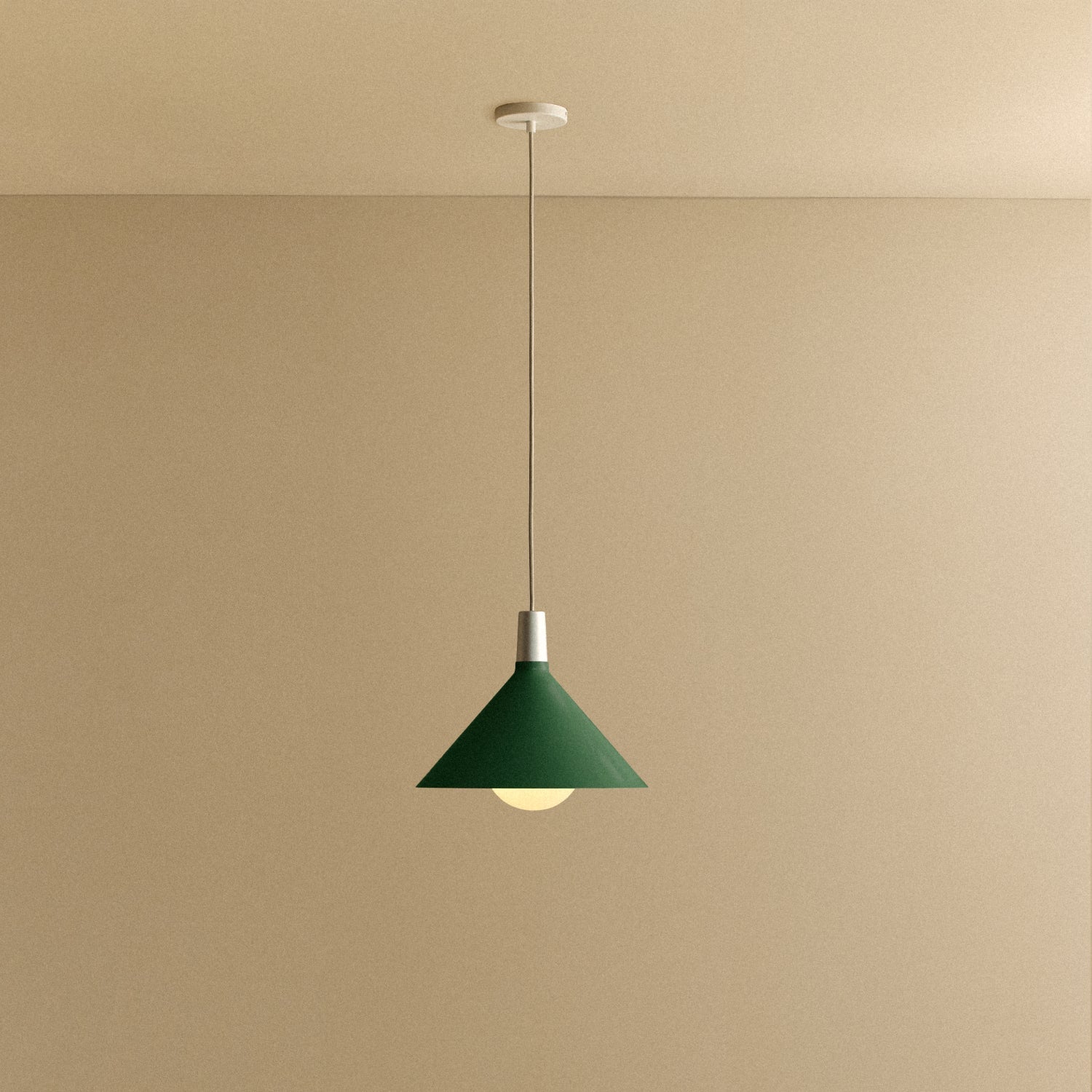 Tala Bower Pendant Light Medium in Dark Green + Sphere IV shown illuminated