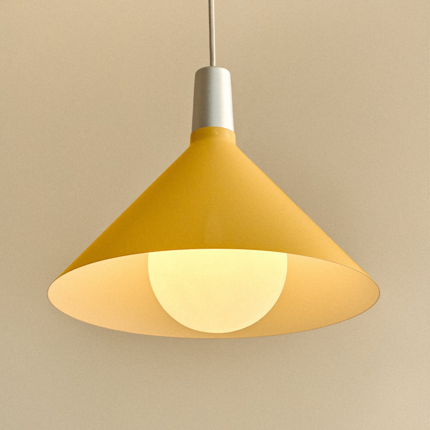 Tala Bower Pendant Light Medium in Yellow + Sphere IV close-up detail of the finish