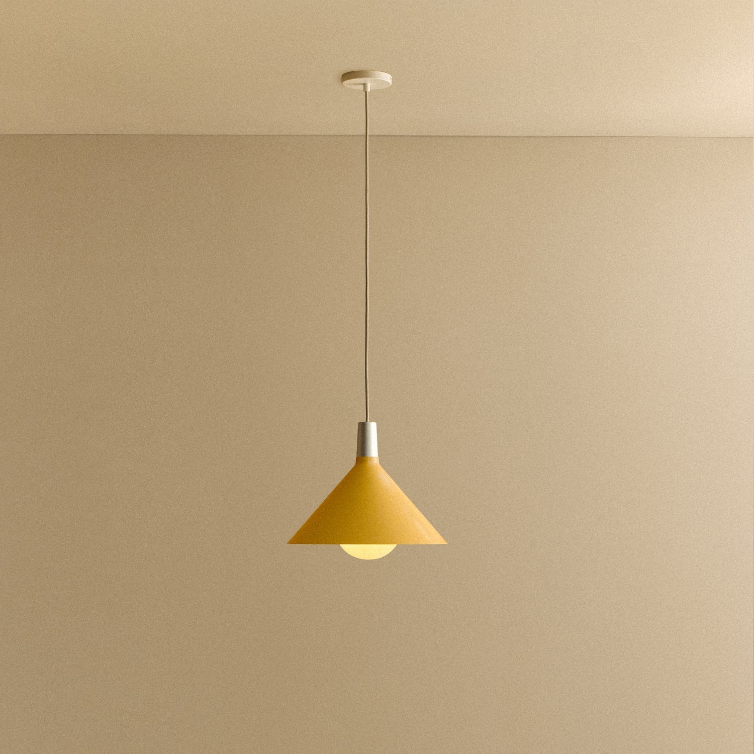 Tala Bower Pendant Light Medium in Yellow + Sphere IV shown illuminated