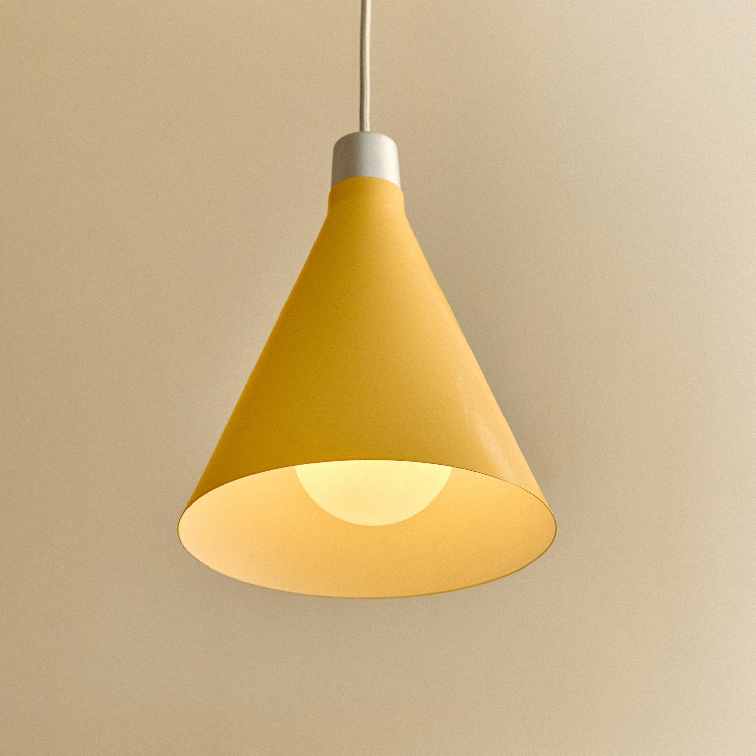 Tala Bower Pendant Light Small in Yellow + Sphere III close-up detail of the finish