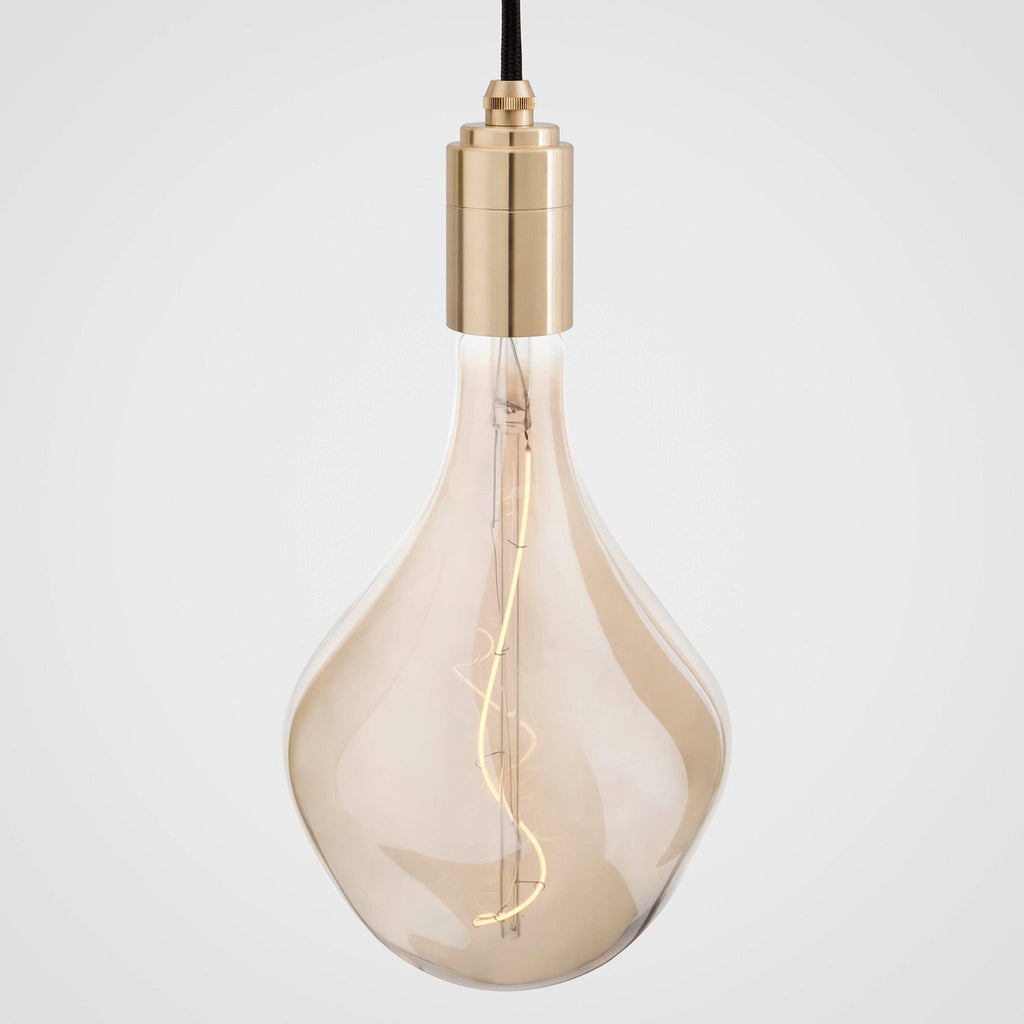 Tala Linear Triple Pendant in Brass + Voronoi II shown illuminated (view 2)