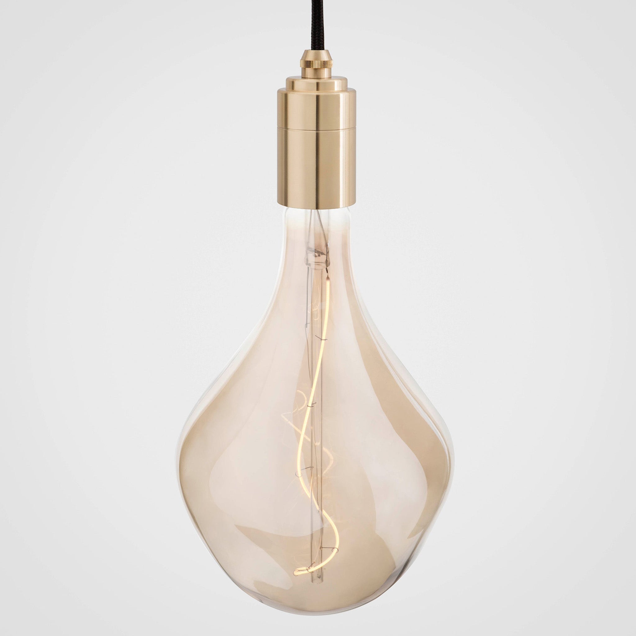 Tala Linear Triple Pendant in Brass + Voronoi II shown illuminated (view 2)