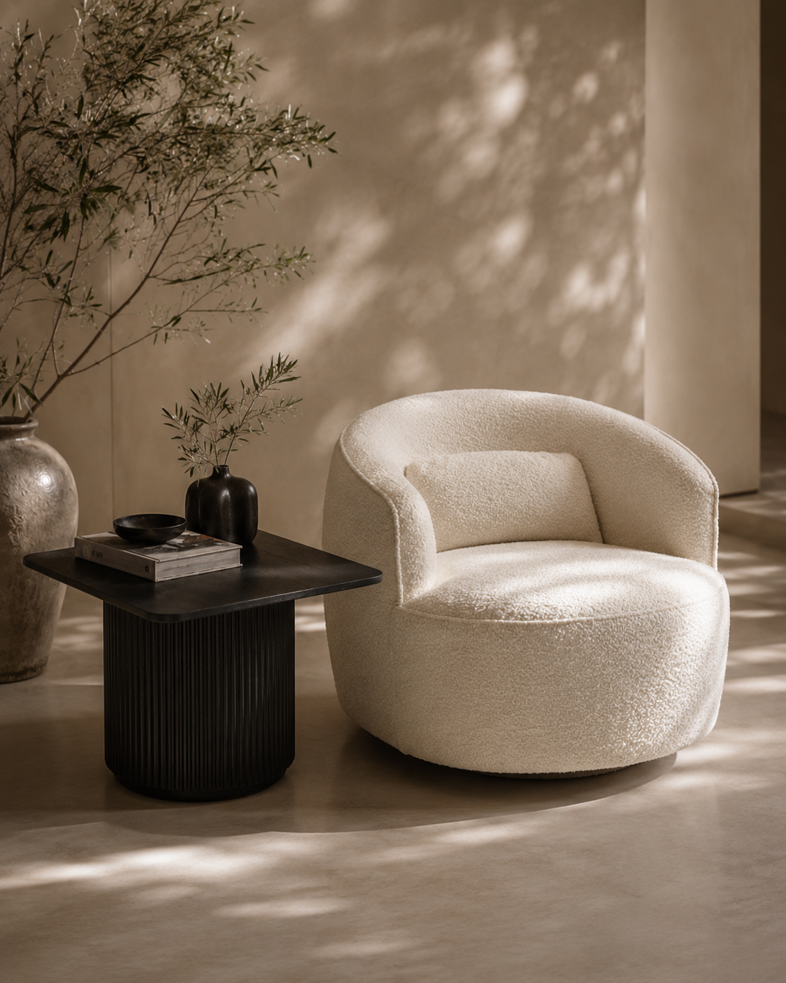 Tommy Franks Grace swivel chair in Polar bouclé