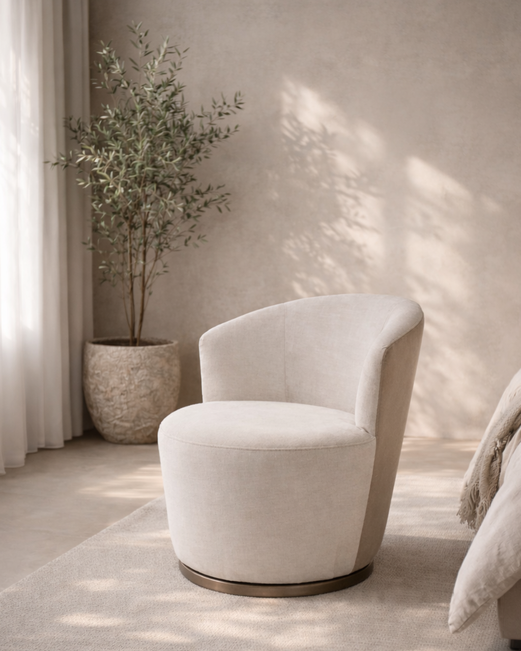 Tommy Franks Derry swivel chair in Bella Velour cream and taupe