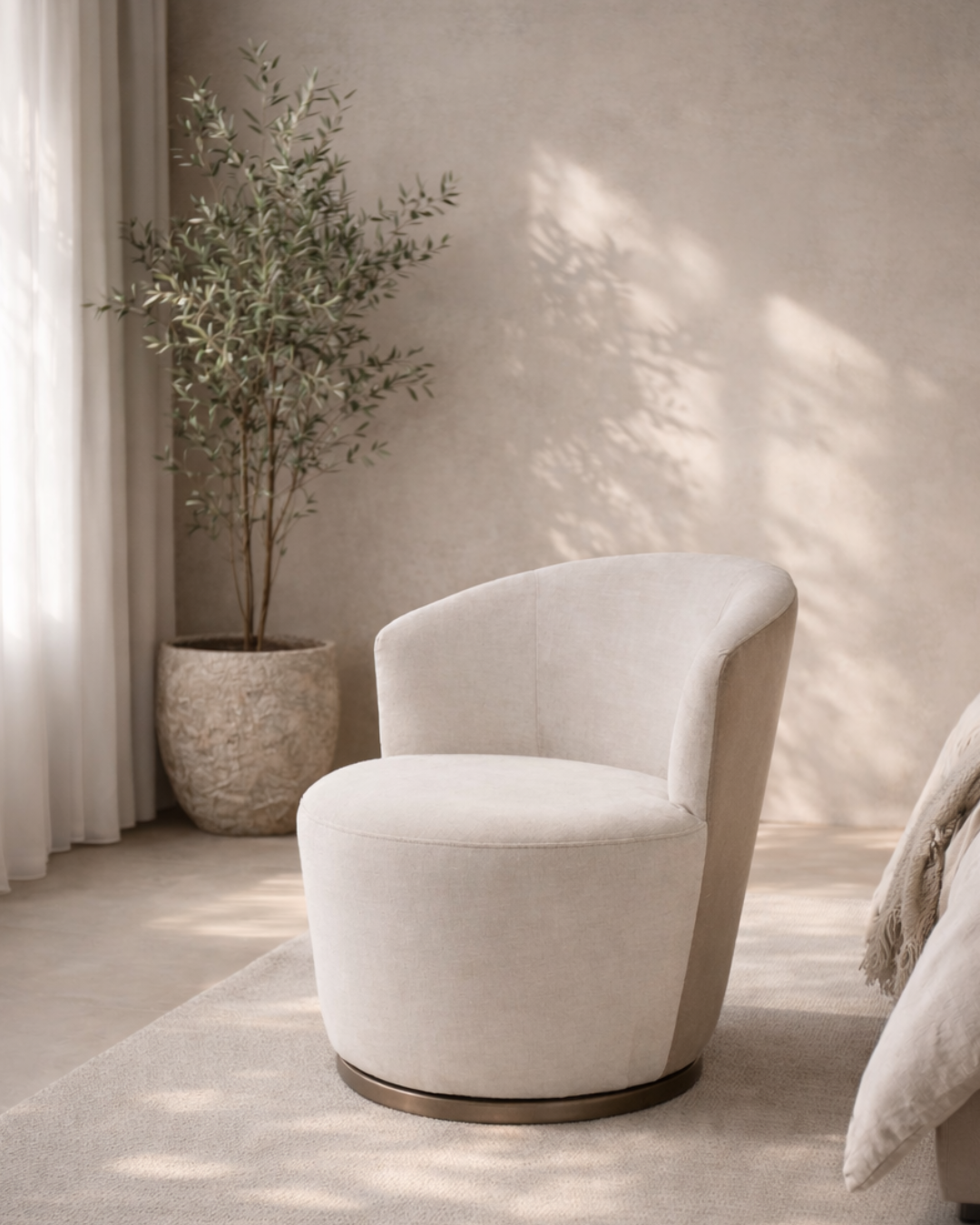 Tommy Franks Derry swivel chair in Bella Velour cream and taupe