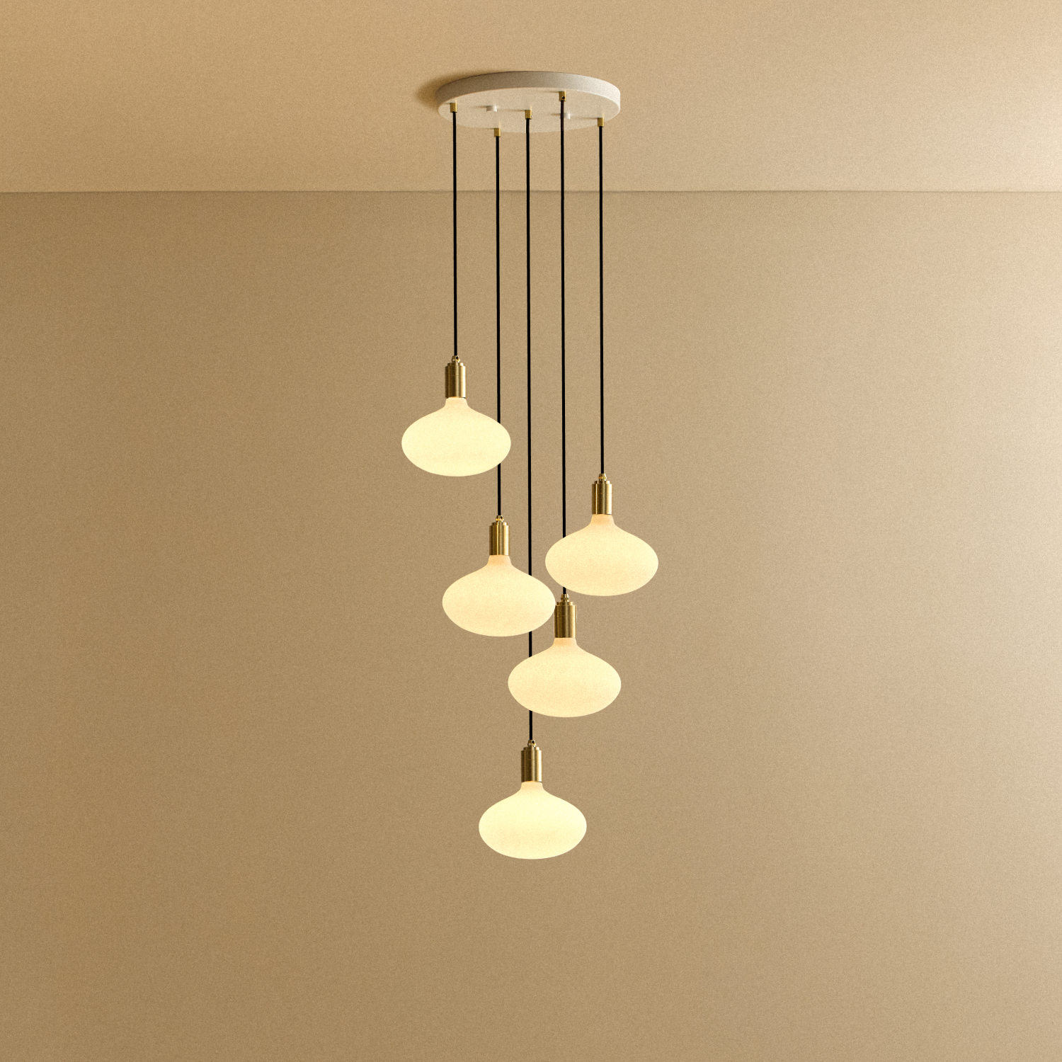 Tala Five Pendant in Brass + Oval II shown illuminated