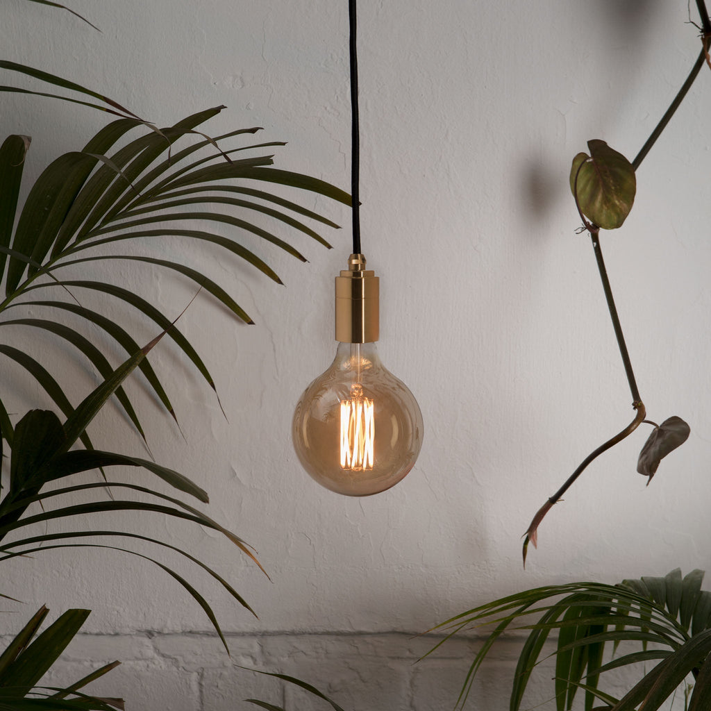 Tala Gaia Pendant Light in Brass in a styled interior setting (view 4)