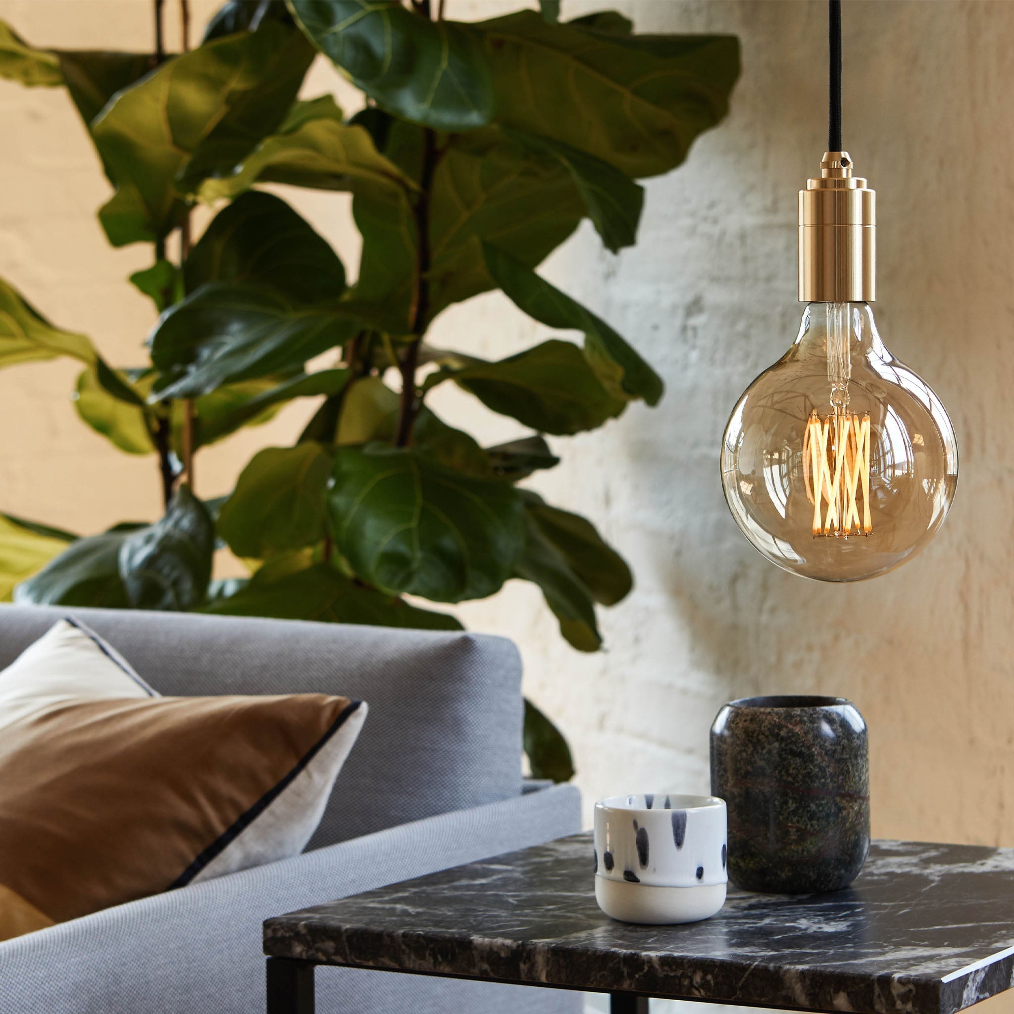 Tala Gaia Pendant Light in Brass in a styled interior setting (view 3)