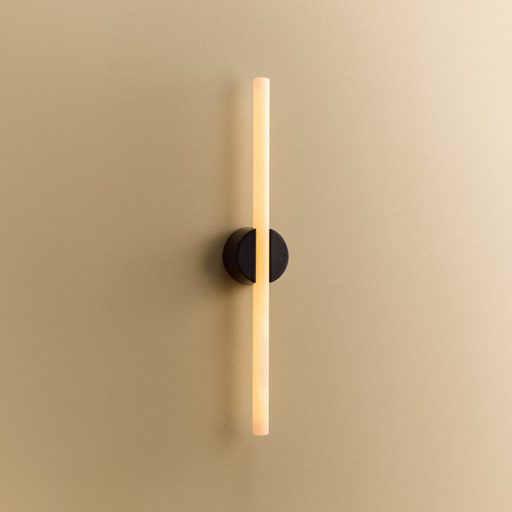Tala Kilter 1.0 Wall Light in Dark Grey shown illuminated (view 2)
