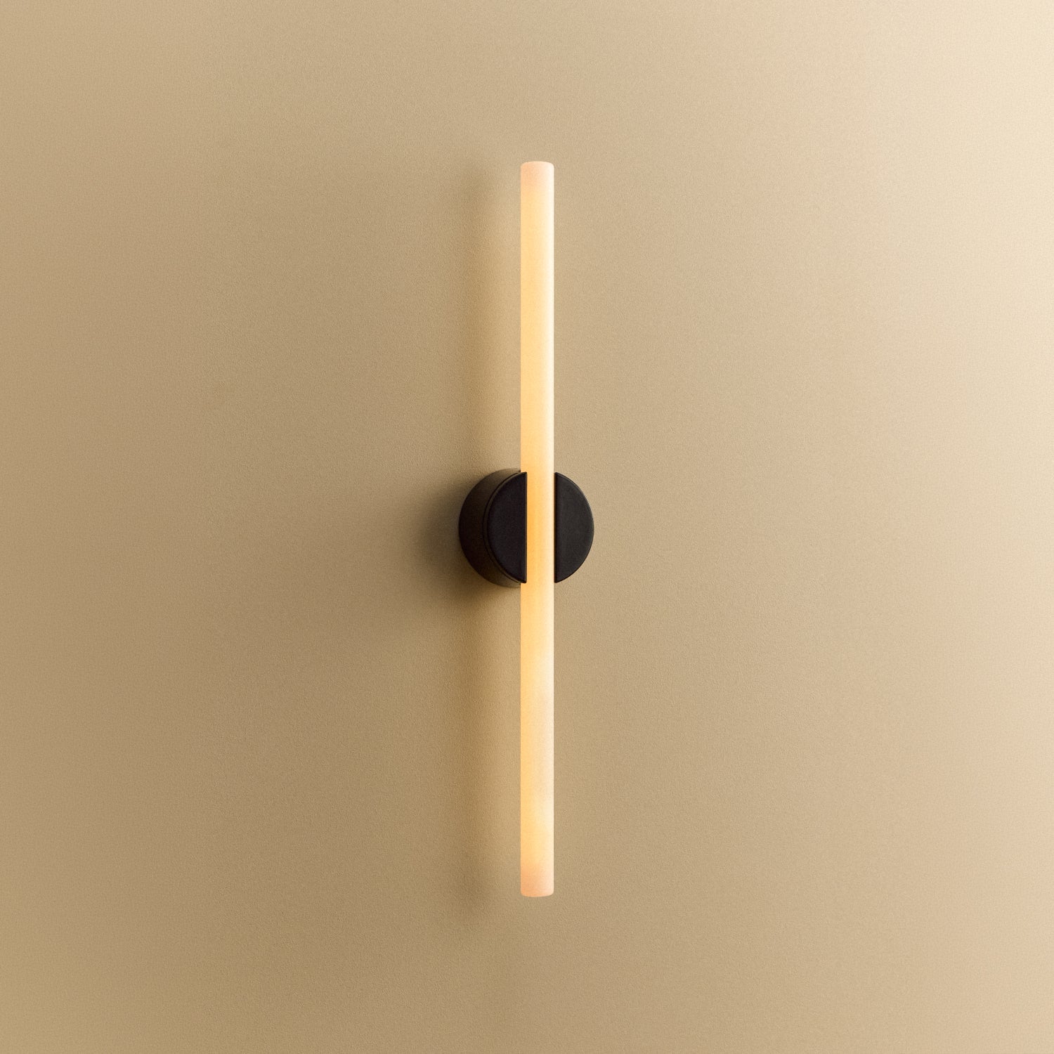 Tala Kilter 2.0 Wall Light in Dark Grey shown illuminated