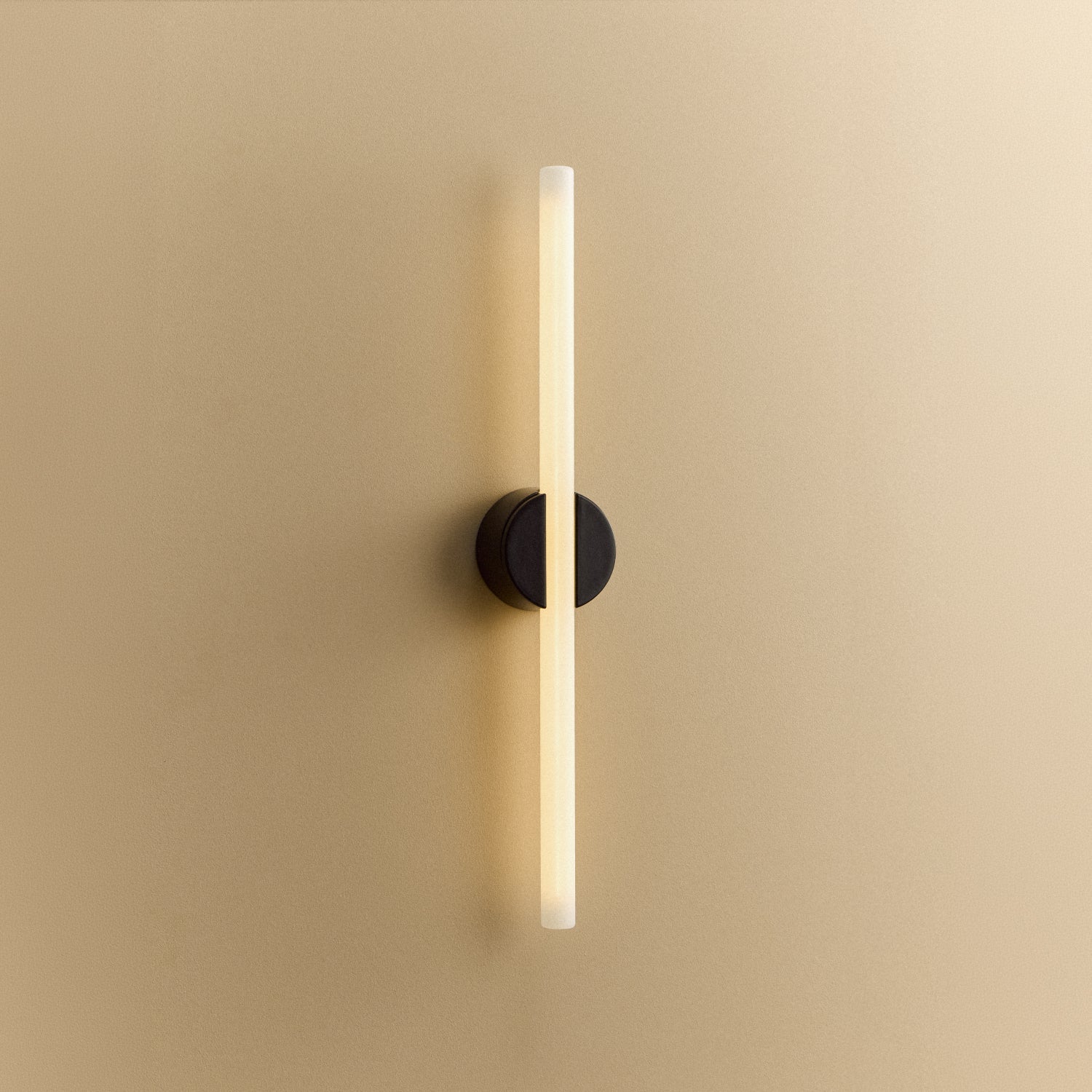 Tala Kilter 2.0 Wall Light in Dark Grey shown illuminated (view 2)
