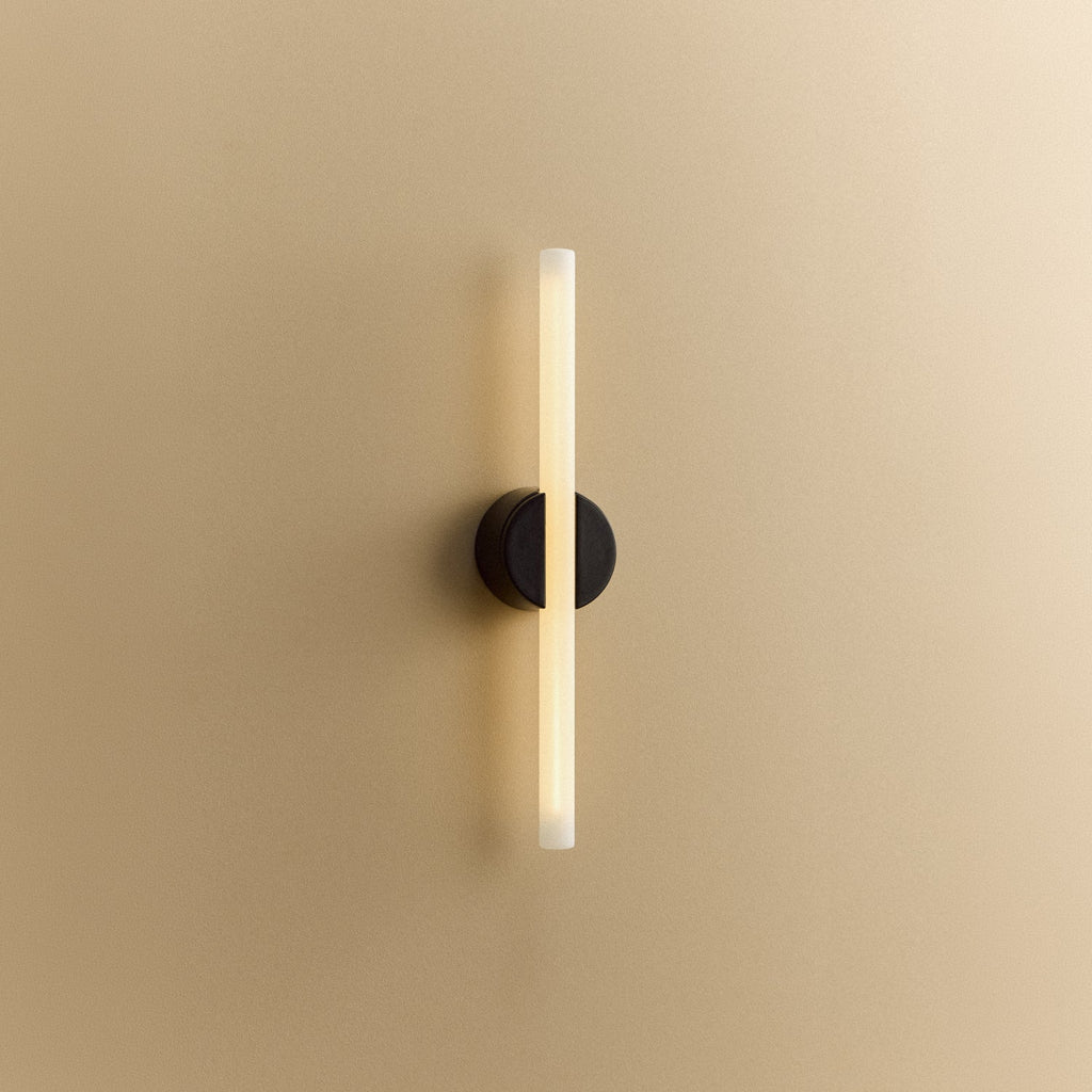 Tala Kilter 2.0 Wall Light in Dark Grey shown illuminated (view 4)