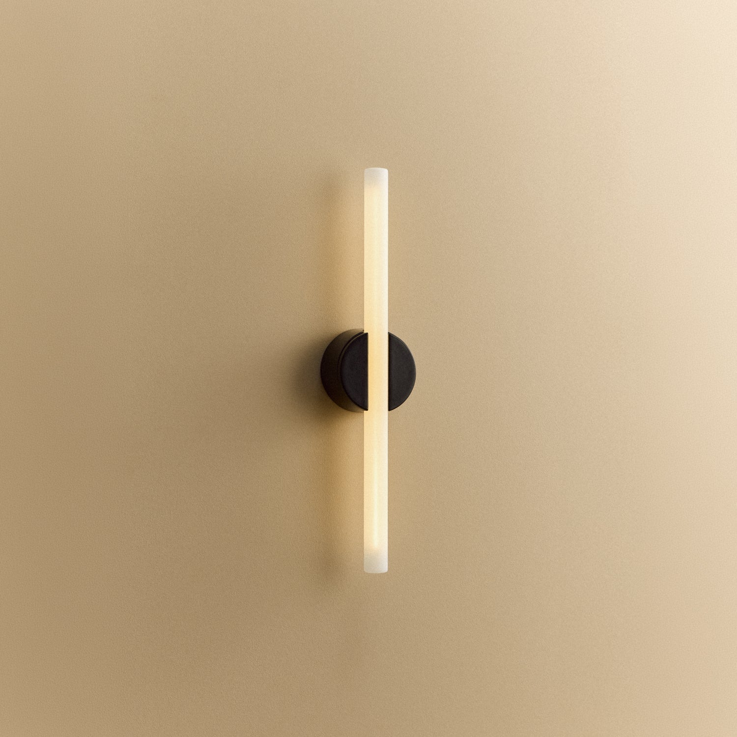 Tala Kilter 2.0 Wall Light in Dark Grey shown illuminated (view 4)