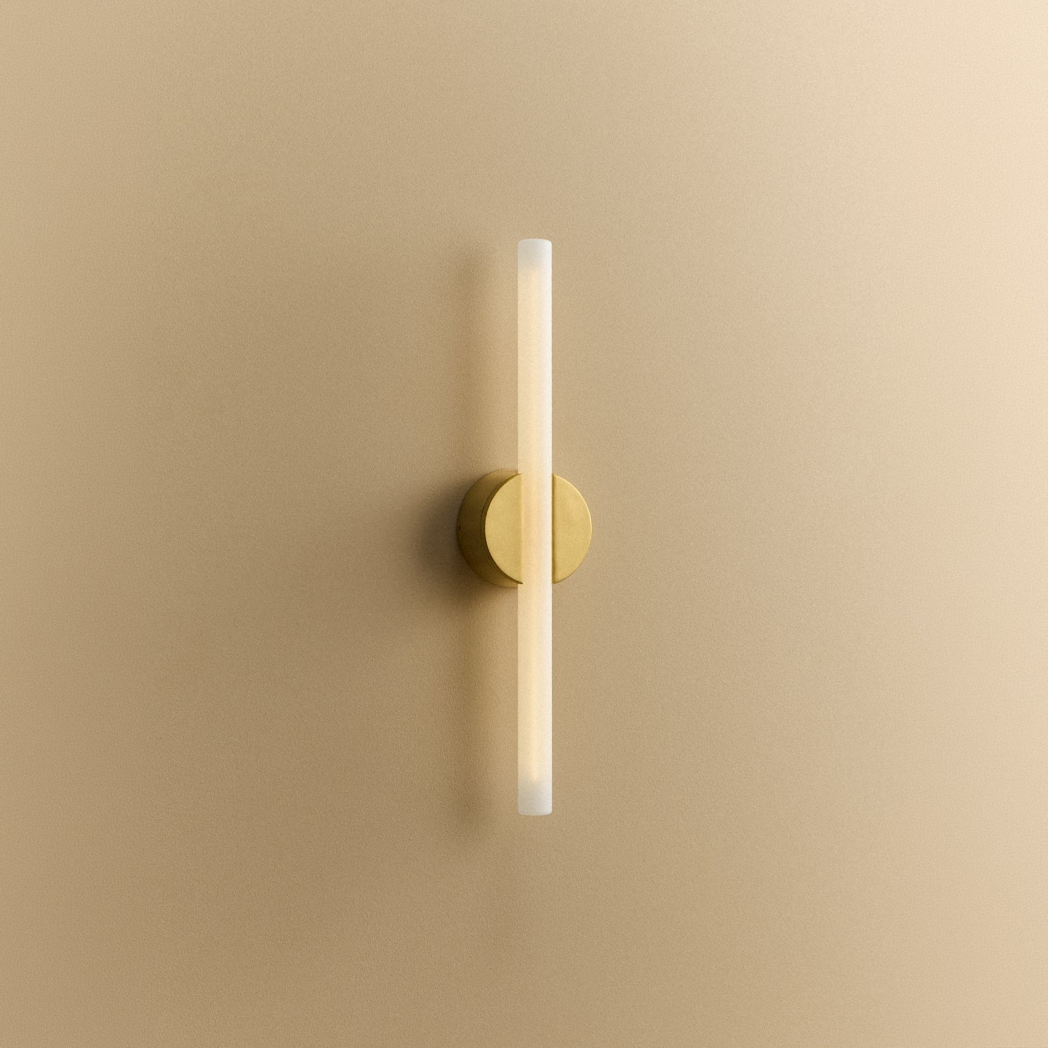 Tala Kilter 2.0 Wall Light in Brushed Brass shown illuminated (view 4)
