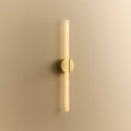 Kilter 2.0 Wall Light in Polished Brass