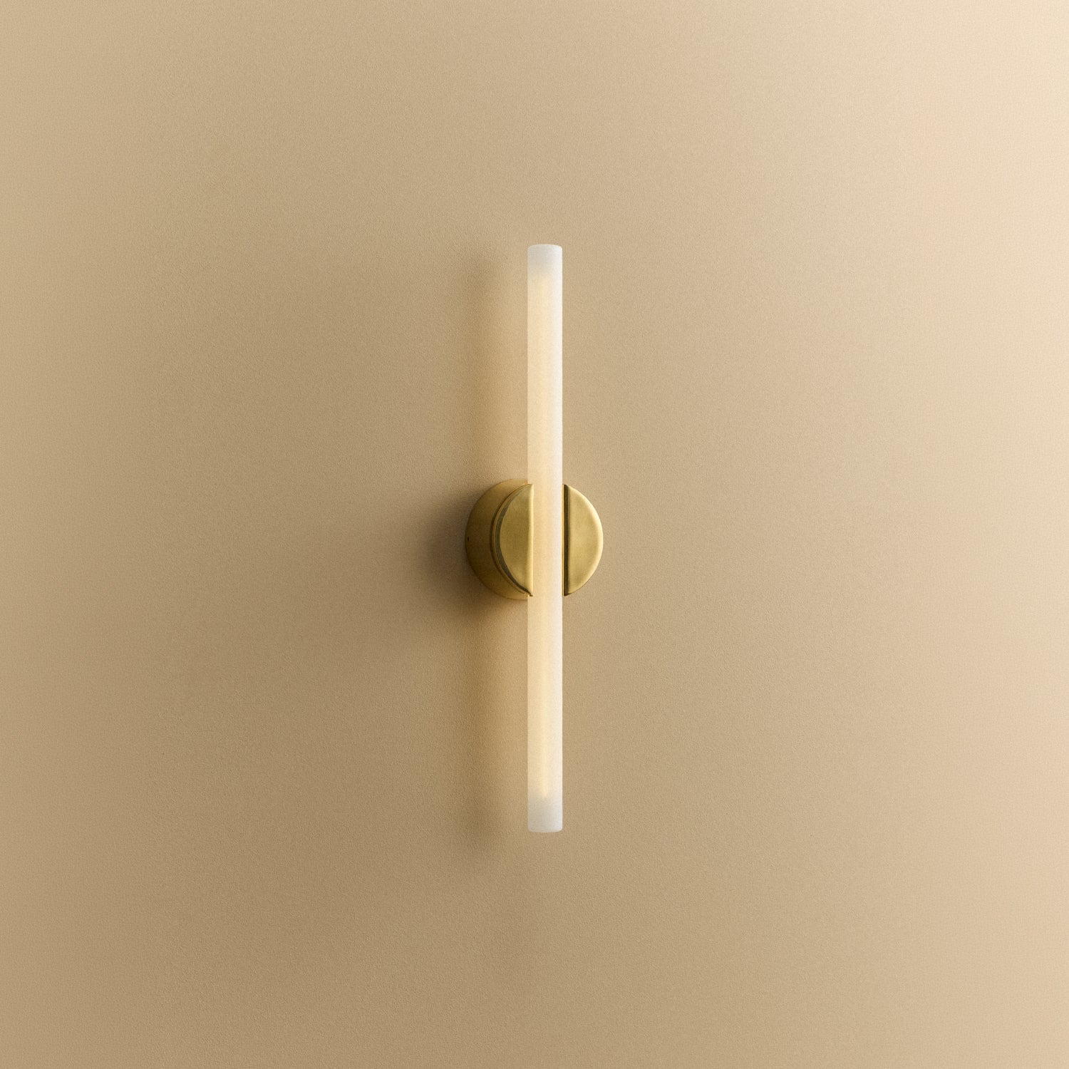 Tala Kilter 2.0 Wall Light in Polished Brass shown illuminated (view 4)