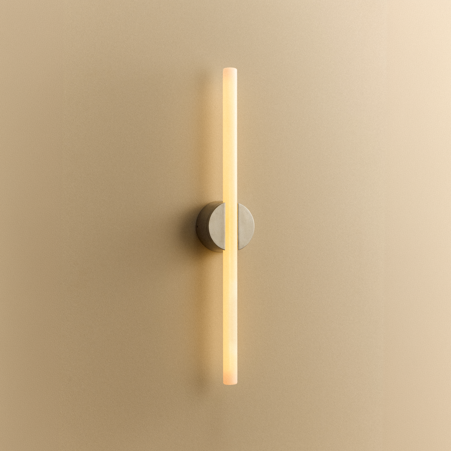 Tala Kilter 2.0 Wall Light in Brushed Stainless Steel shown illuminated