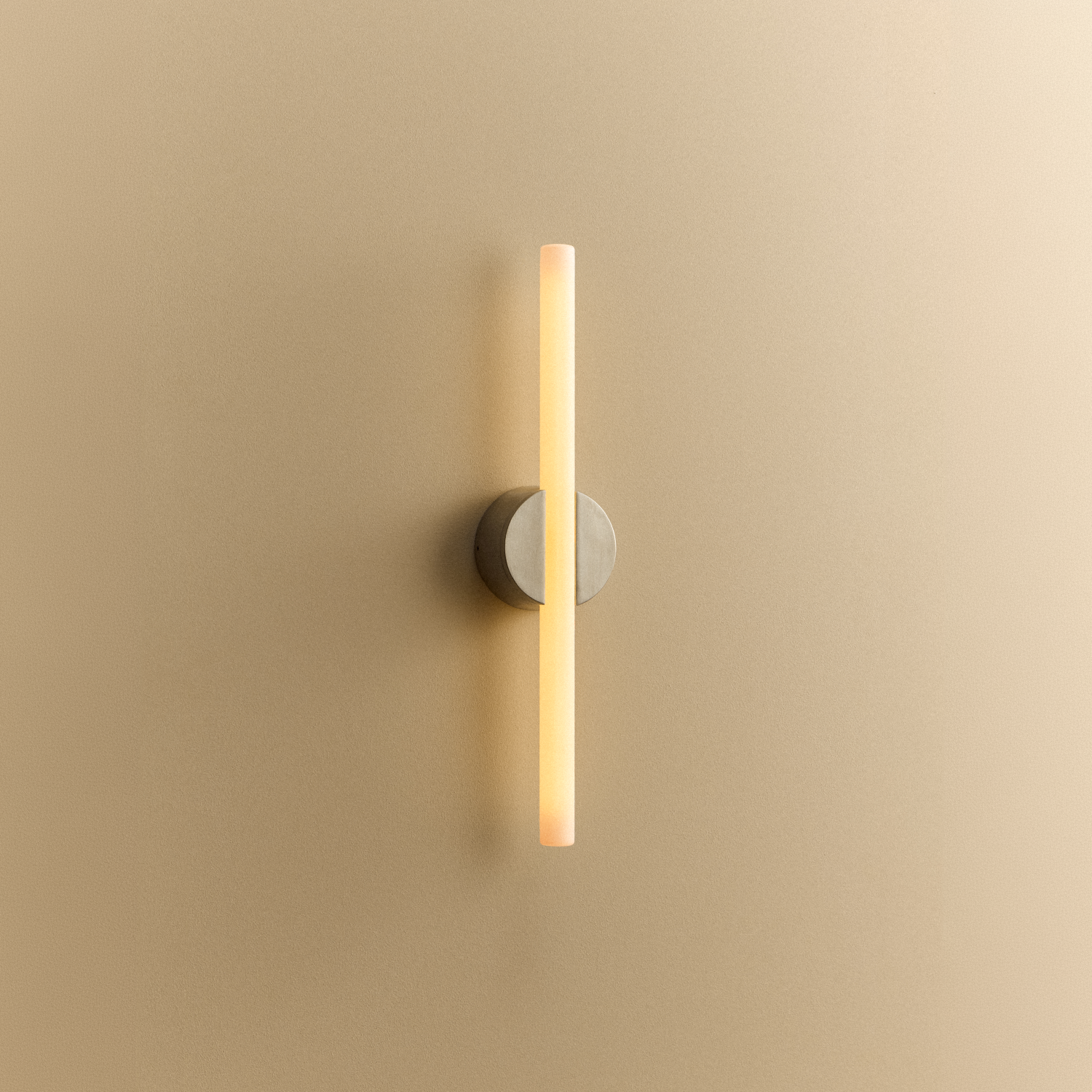 Tala Kilter 2.0 Wall Light in Brushed Stainless Steel shown illuminated (view 3)