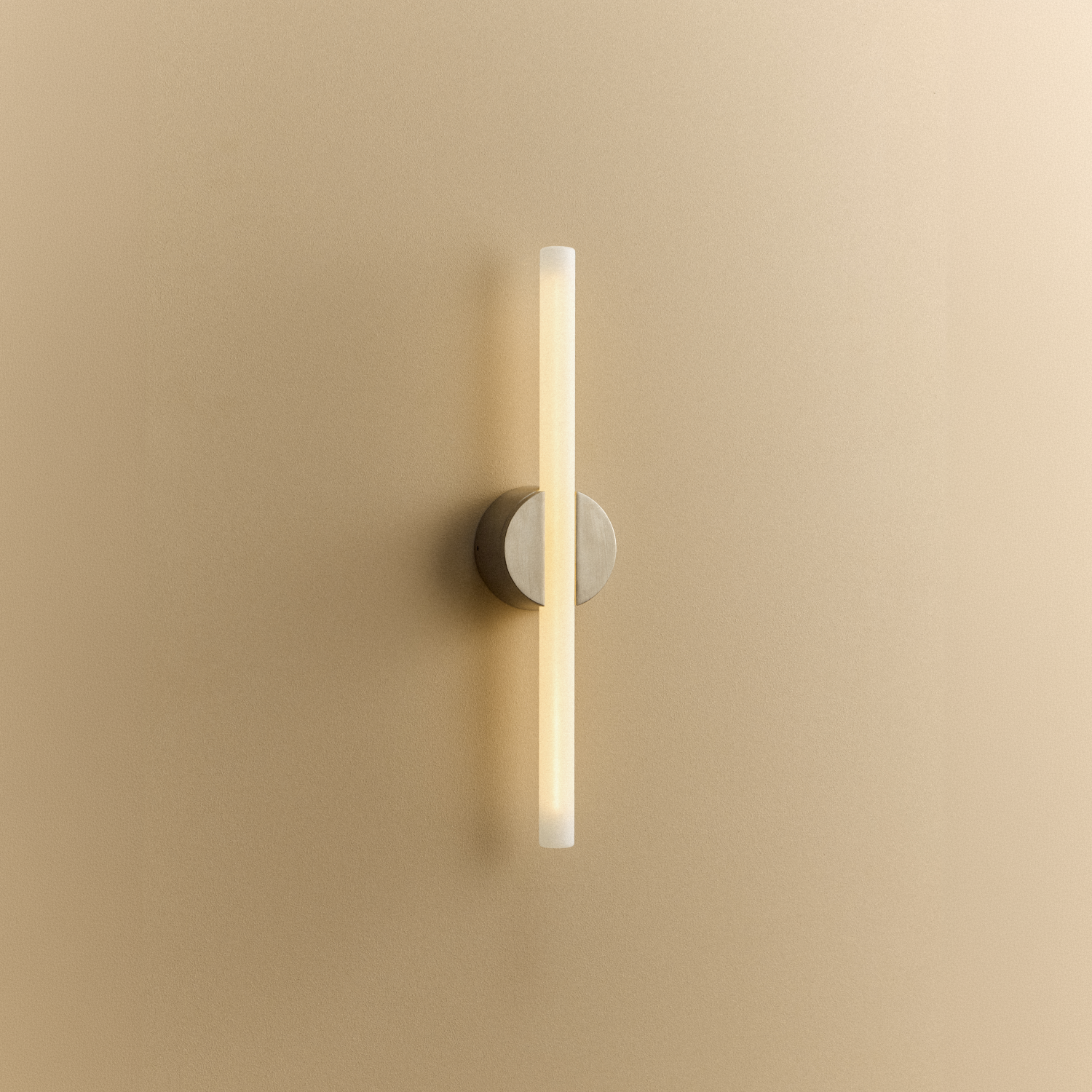 Tala Kilter 2.0 Wall Light in Brushed Stainless Steel shown illuminated (view 4)
