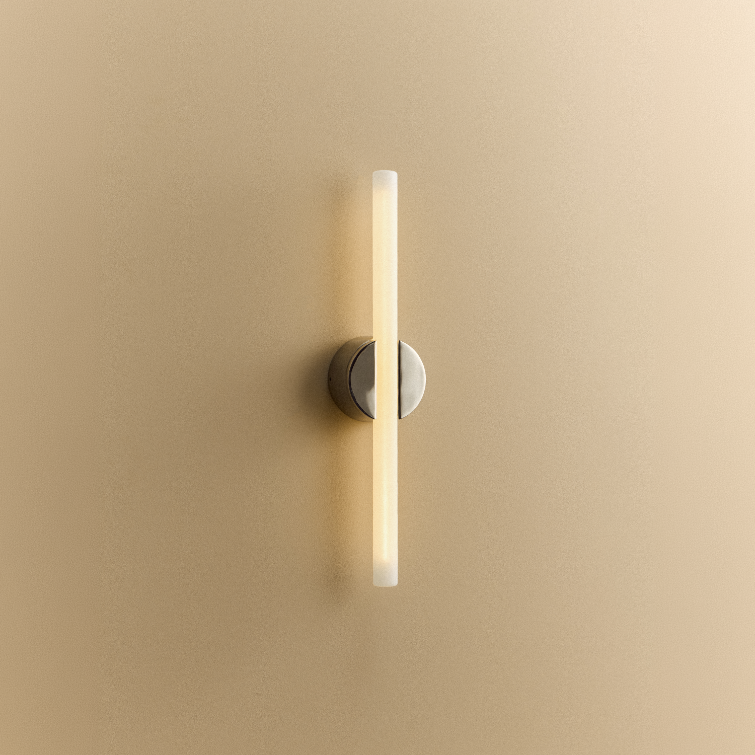 Tala Kilter 2.0 Wall Light in Polished Stainless Steel shown illuminated (view 4)