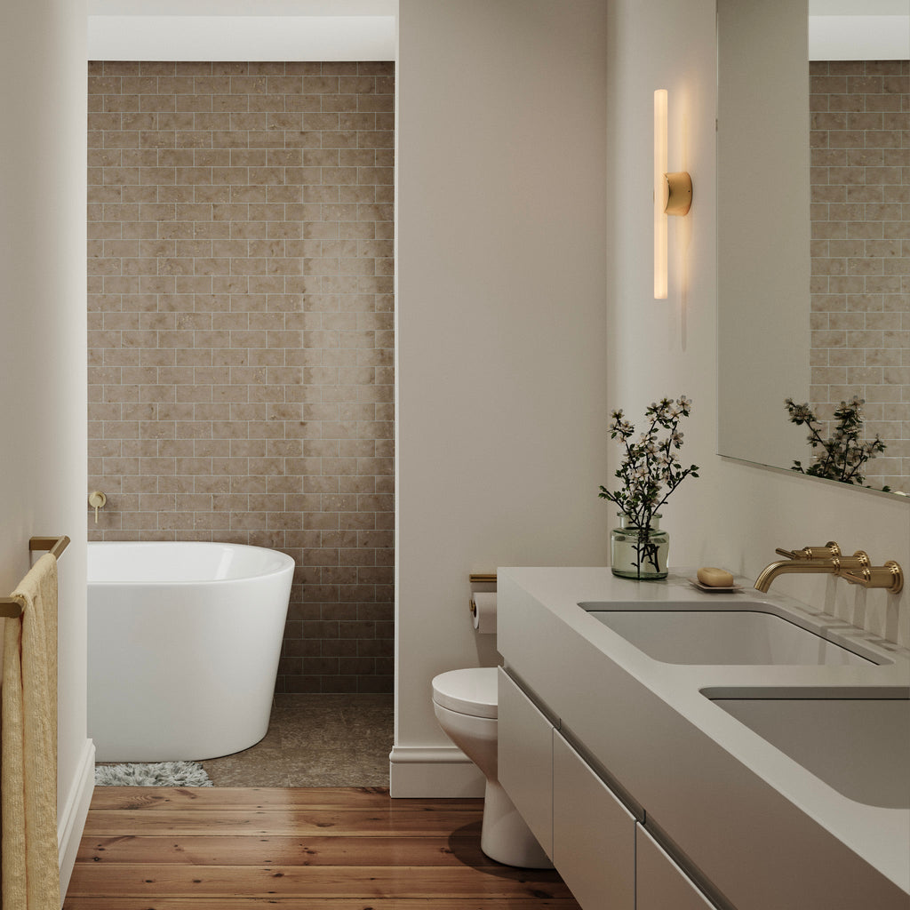 Tala Kilter 1.0 Wall Light in Solid Brass in a styled interior setting (view 3)