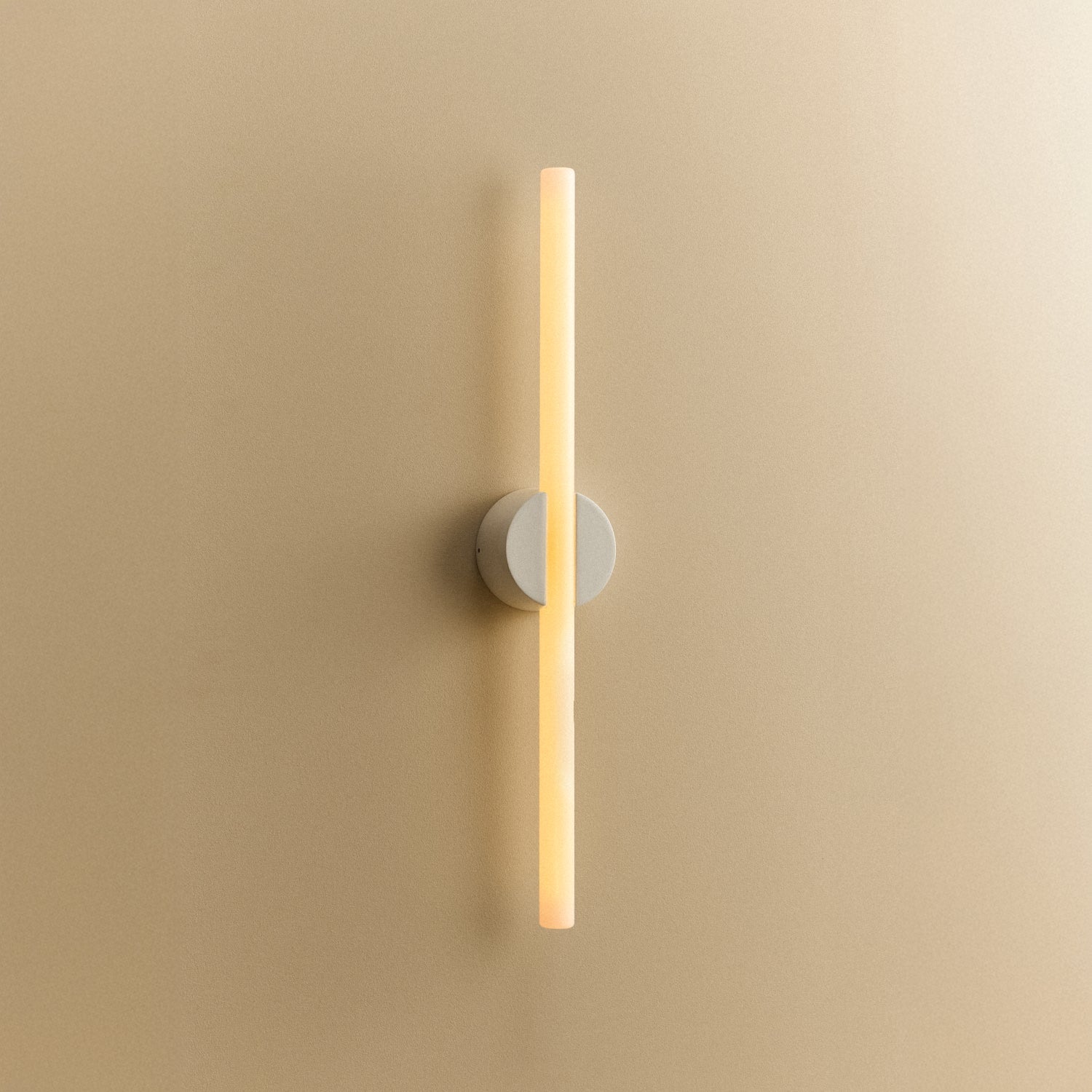 Tala Kilter 1.0 Wall Light in White shown illuminated (view 2)