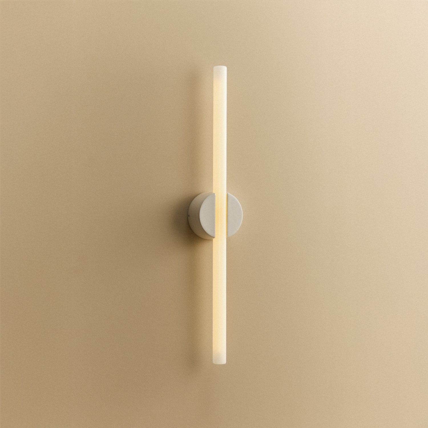 Tala Kilter 1.0 Wall Light in White shown illuminated