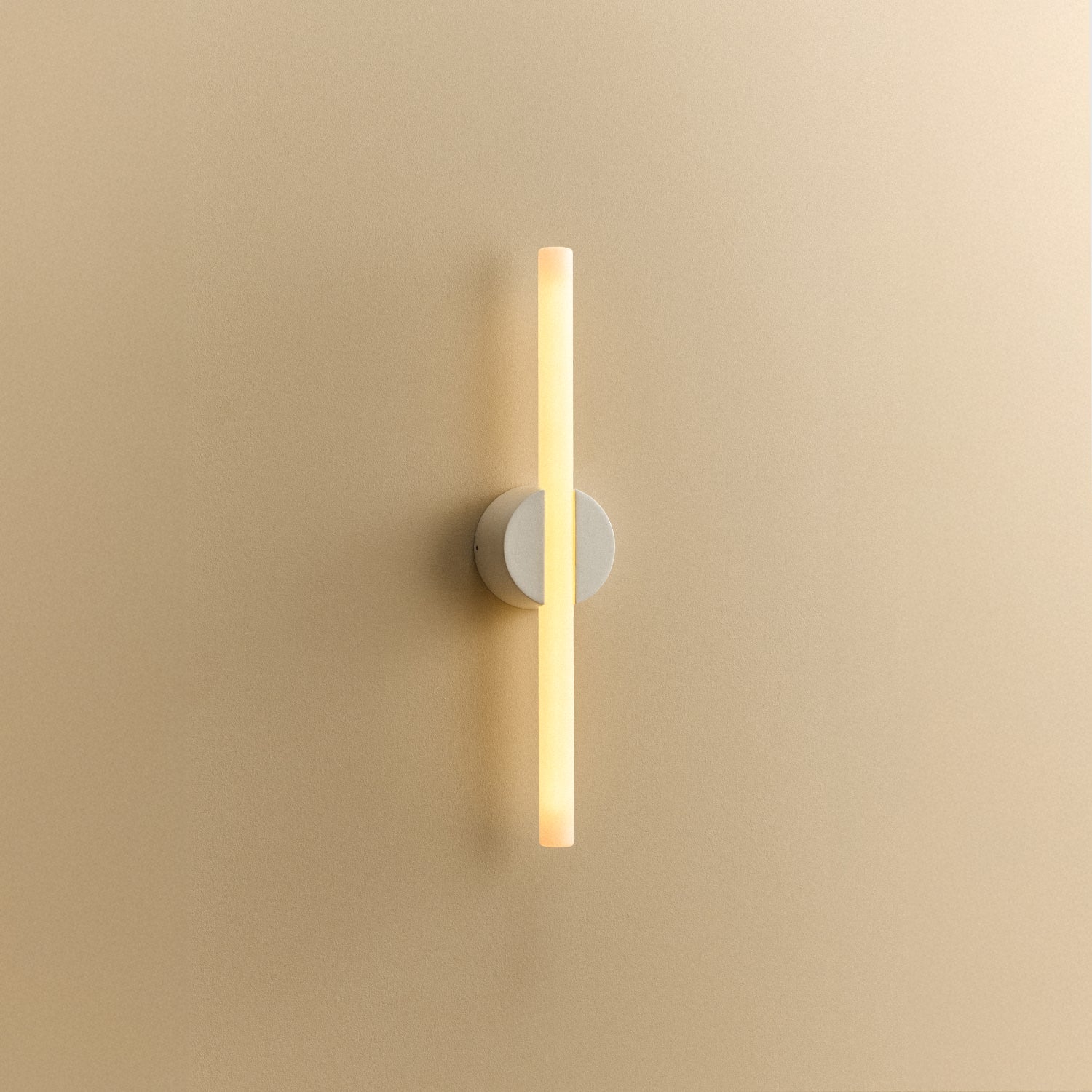 Tala Kilter 1.0 Wall Light in White shown illuminated (view 3)
