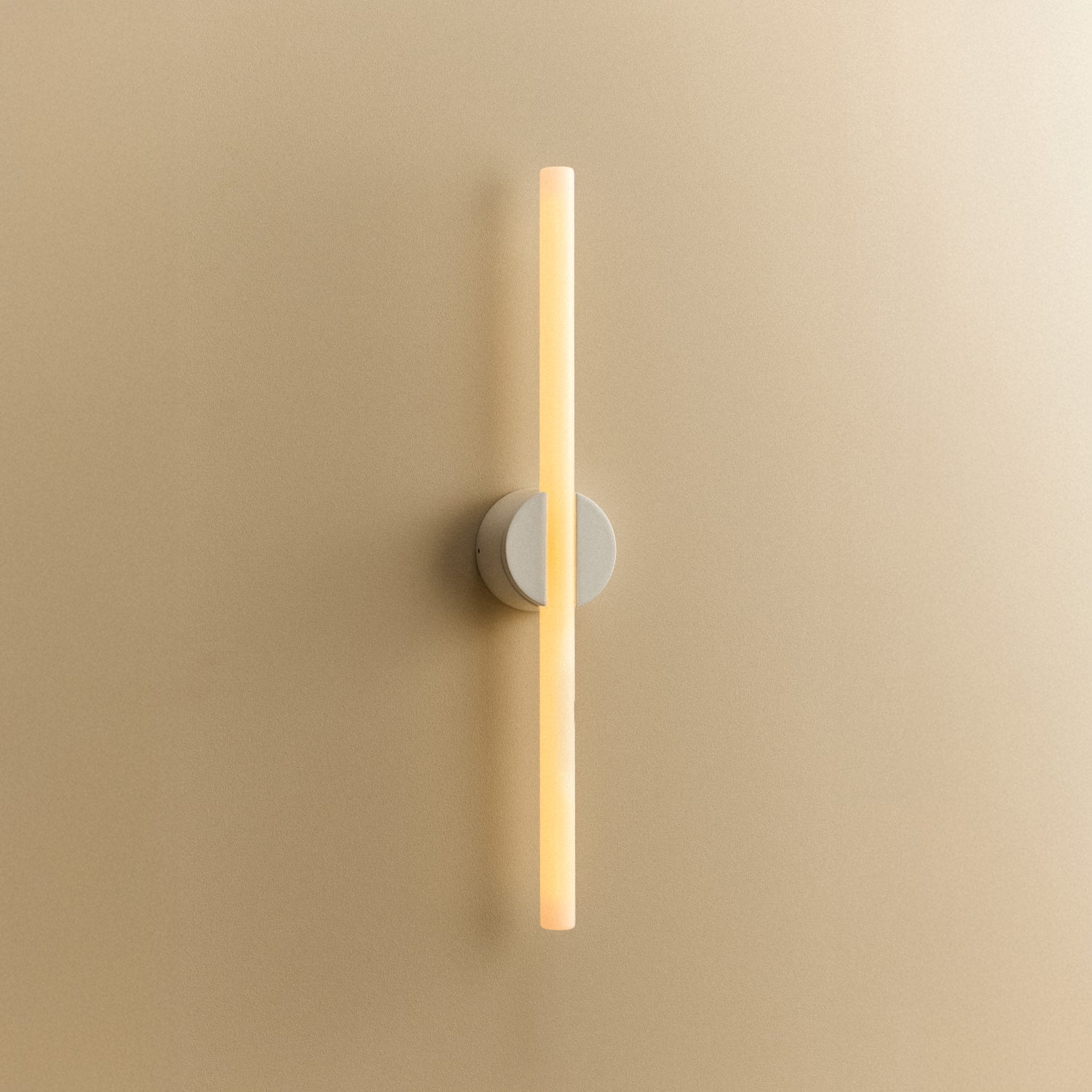 Tala Kilter 2.0 Wall Light in White shown illuminated