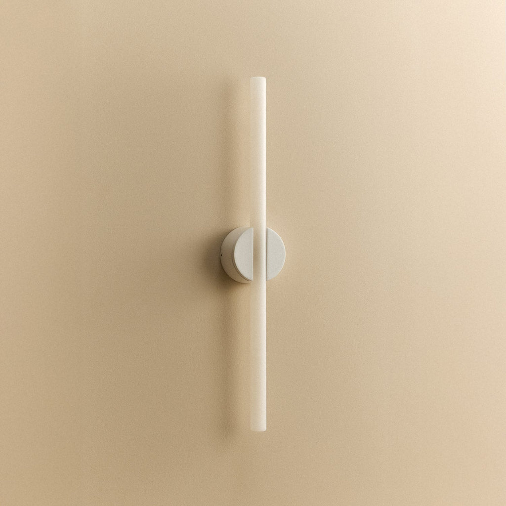 Tala Kilter 2.0 Wall Light in White shown unlit
