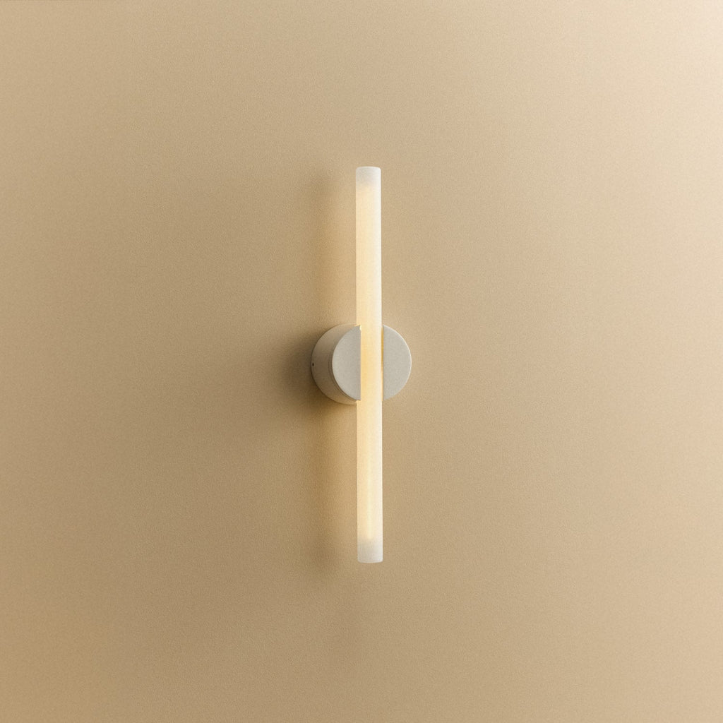 Tala Kilter 2.0 Wall Light in White shown illuminated (view 4)