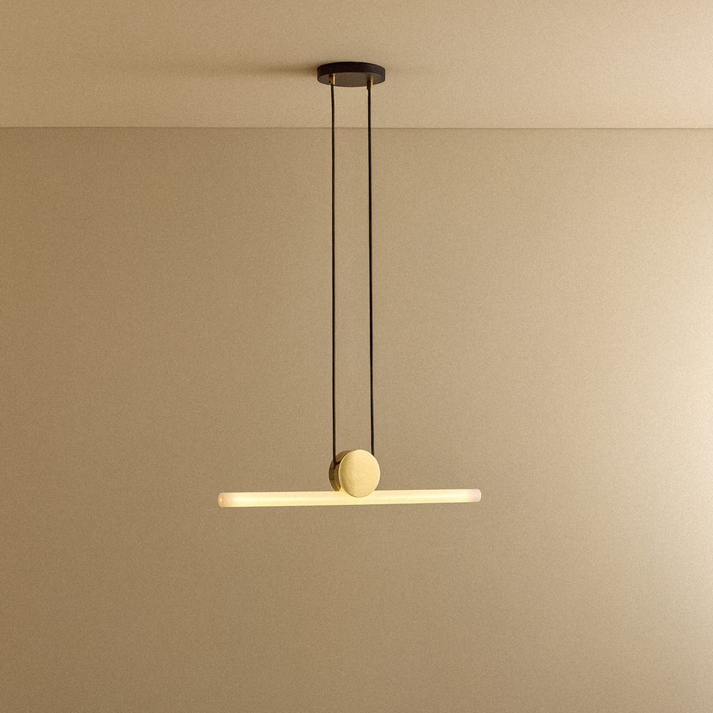 Tala Kilter Pendant Light shown illuminated