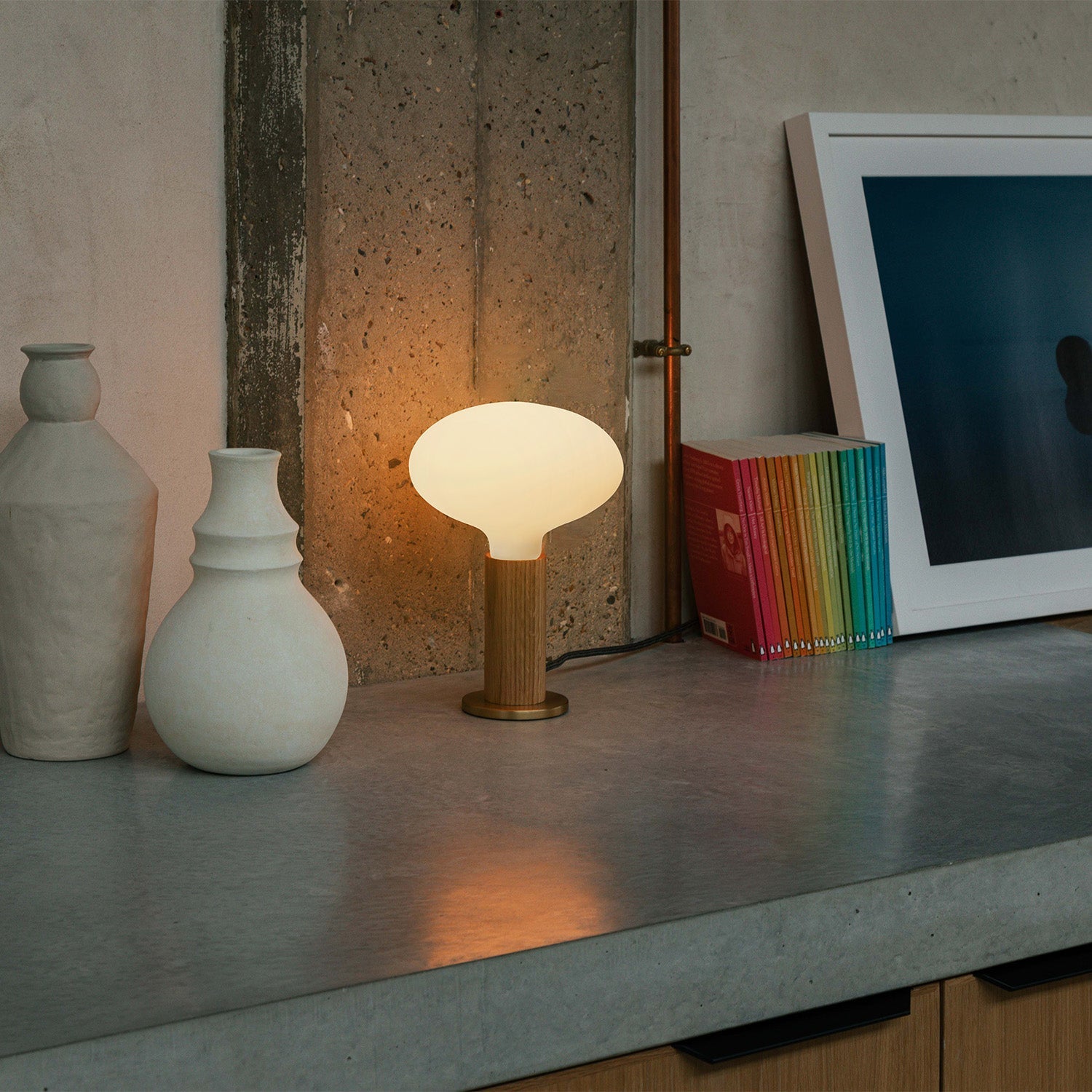Tala Knuckle Table Lamp in Oak + Oval in a styled interior setting
