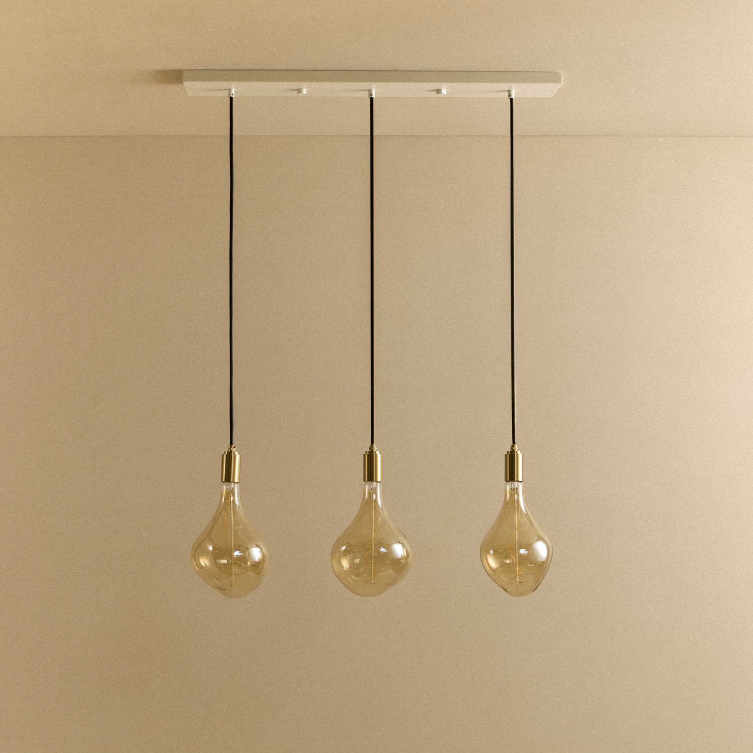 Tala Linear Triple Pendant in Brass + Voronoi II shown unlit