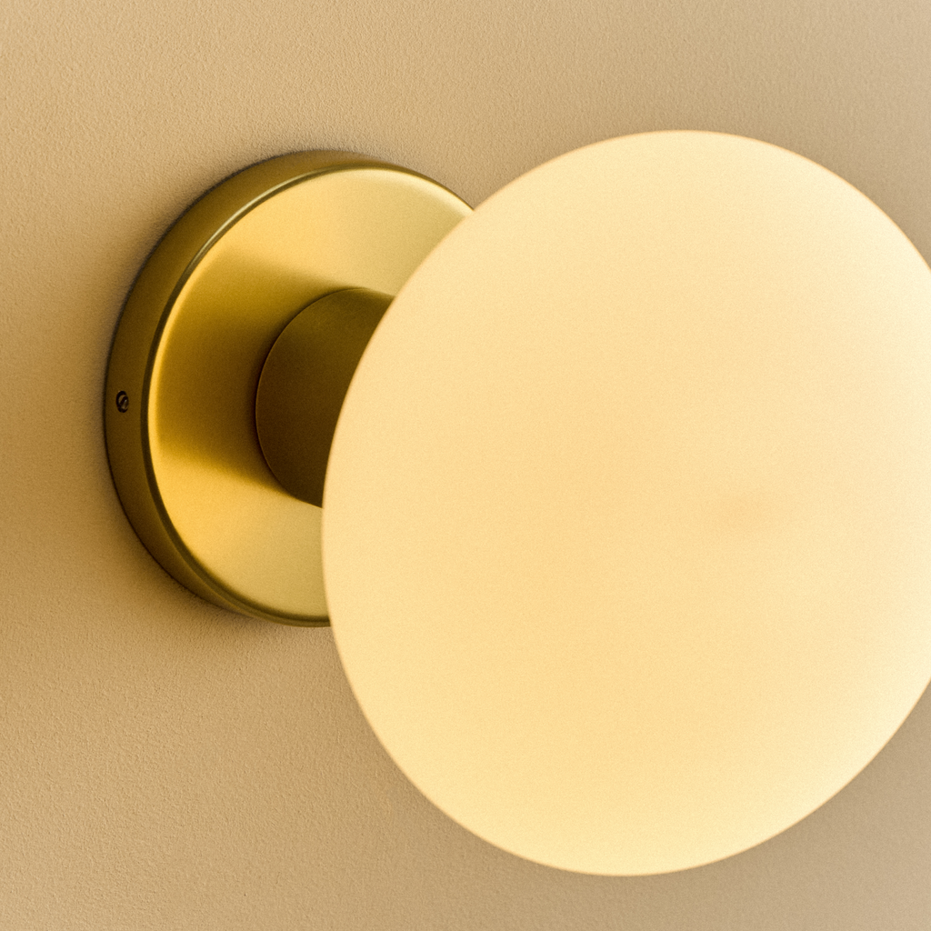 Tala Lochan Wall Light in Brass + Oval Dim to Warm close-up detail of the finish