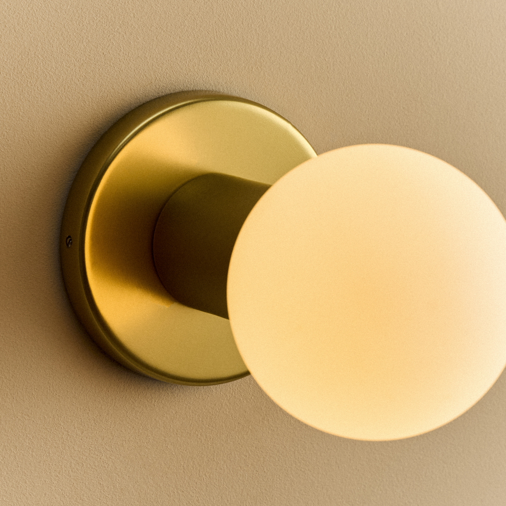 Tala Lochan Wall Light in Brass + Sphere III close-up detail of the finish