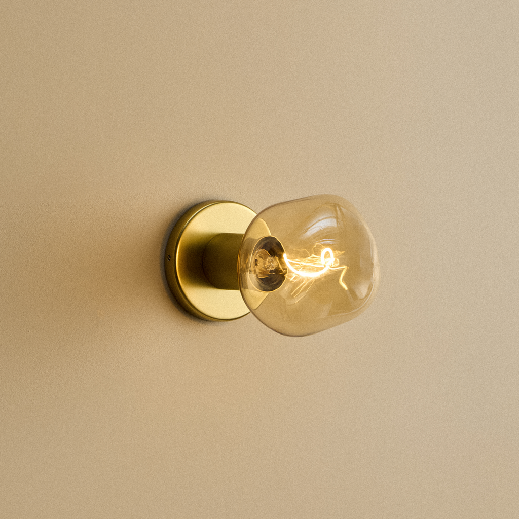 Tala Lochan Wall Light in Brass + Voronoi I shown illuminated