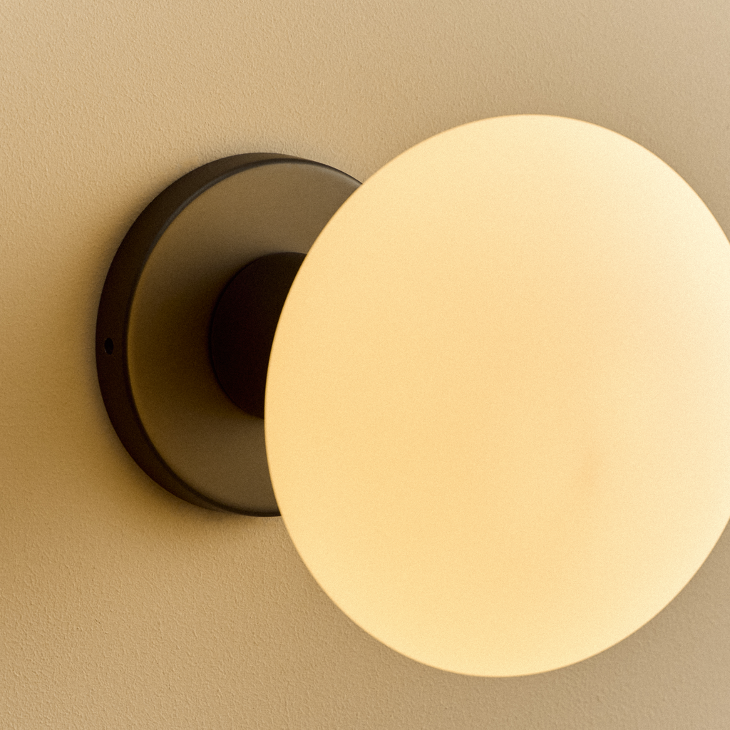 Tala Lochan Wall Light in Graphite + Oval Dim to Warm close-up detail of the finish