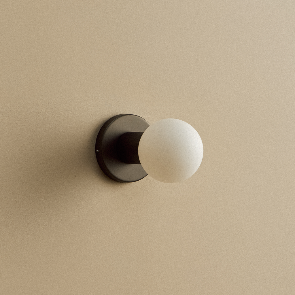 Tala Lochan Wall Light in Graphite + Sphere III shown illuminated (view 2)